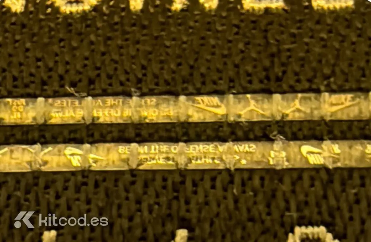 Nike security tag showing metallic strip with holographic effect and embedded SECURITY text - authentic player-spec feature